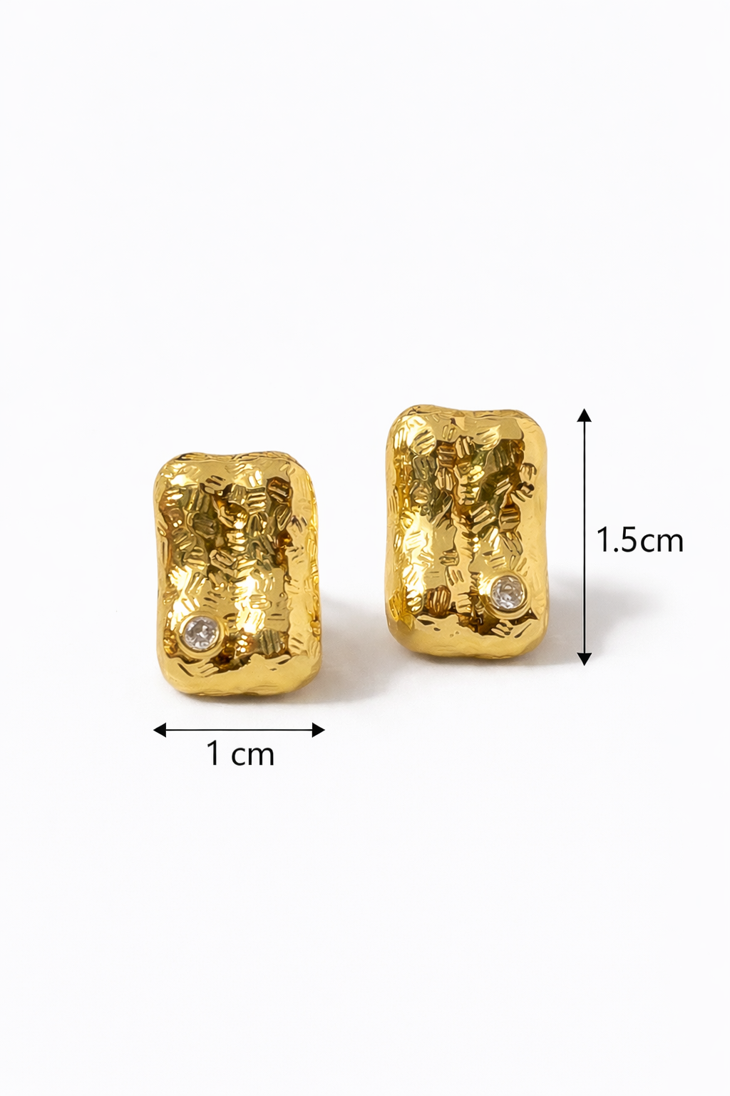Gold earrings with measurements on a white background
